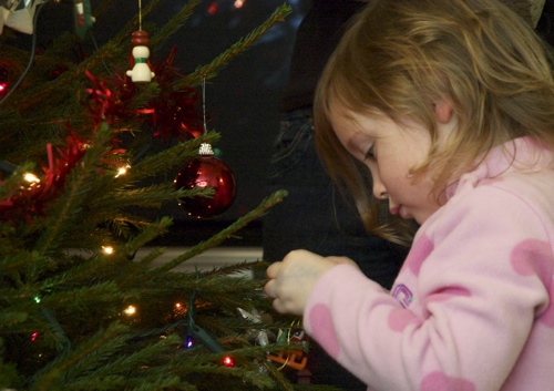 Annabel decorating the Christmas tree